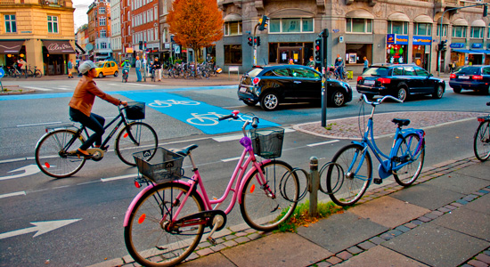 Cyclist in a bike friendly intersection in Copenhagen, Denmark. Photo: City Clock Magazine, Flickr