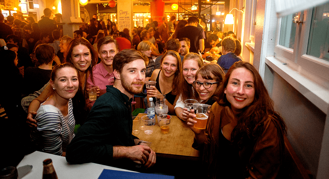 Students gathered at social event at Studenterhuset - a cozy and cheap student café in the heart of Copenhagen